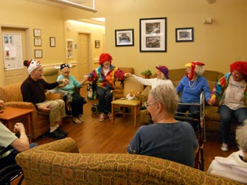 Seniors laughing at the facility
