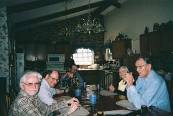 Seniors who are enjoying a meal together at this facility.