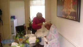 resident getting haircut