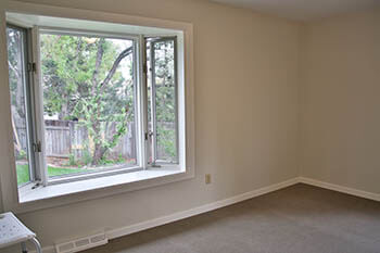 bedroom with bay windows