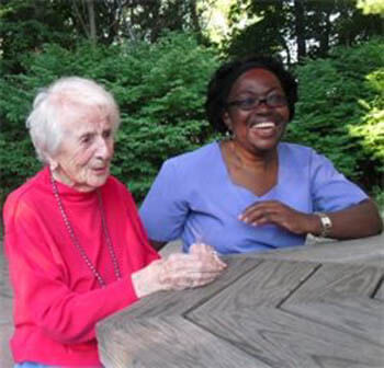 senior at outside table