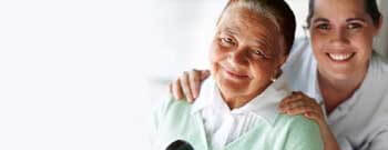 senior and nurse at facility