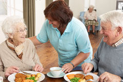 seniors dining at the facility
